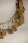 Fanny Fouks Collier à breloques en cuir beige